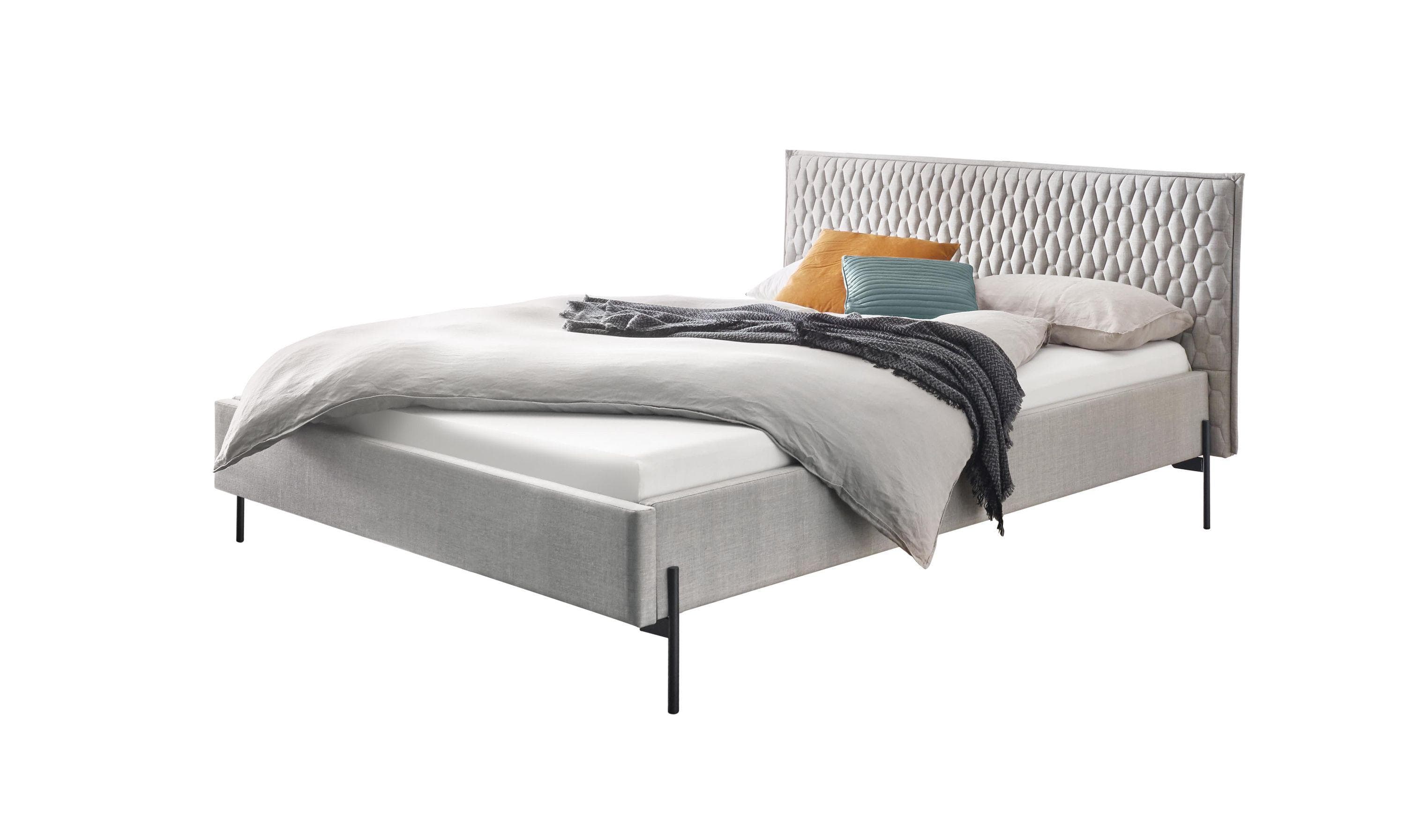 Polsterbett mit Wabensteppung und Stehsaum in Strukturstoff