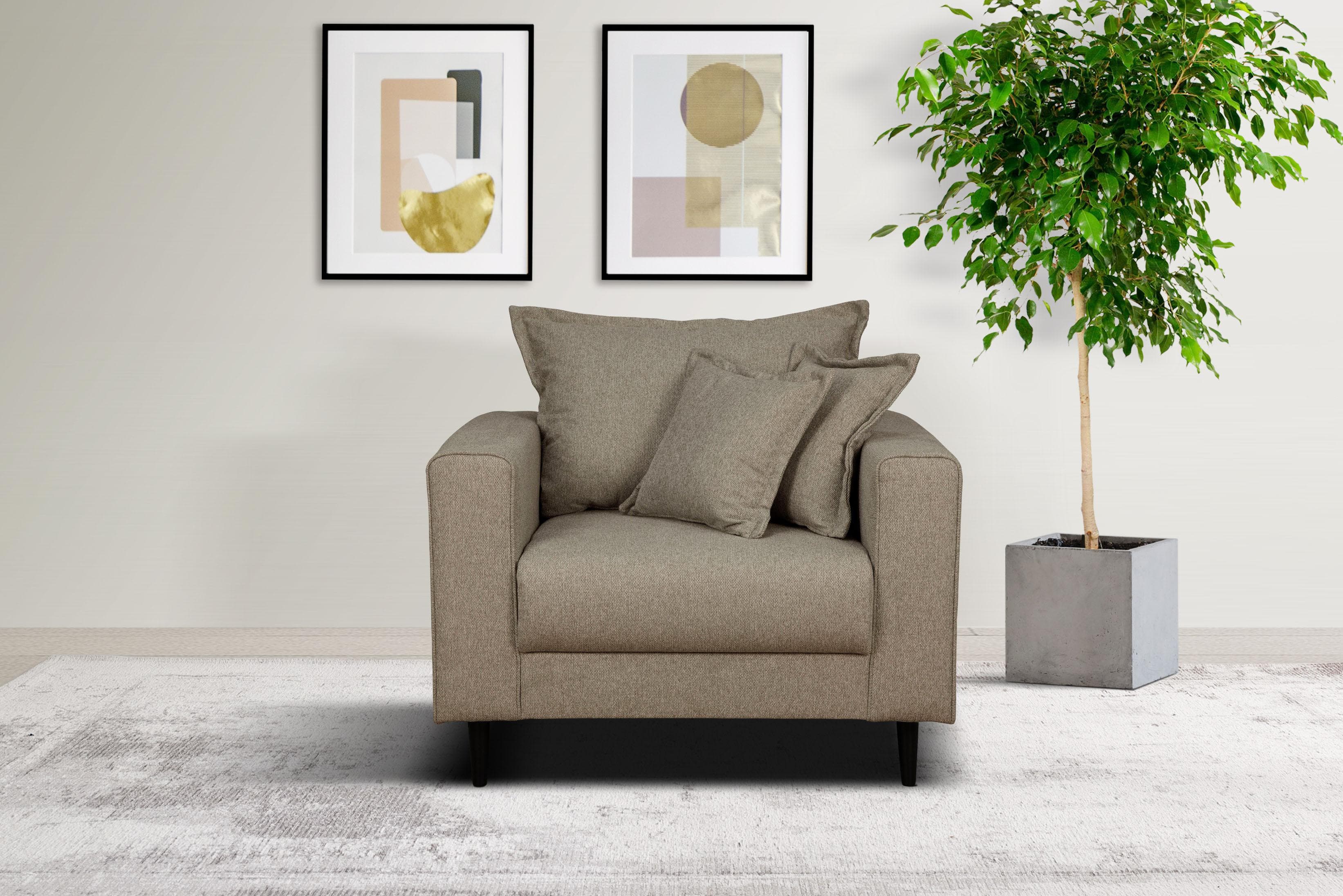 Gemütlicher Sessel mit Kederkissen und losem Rückenkissen