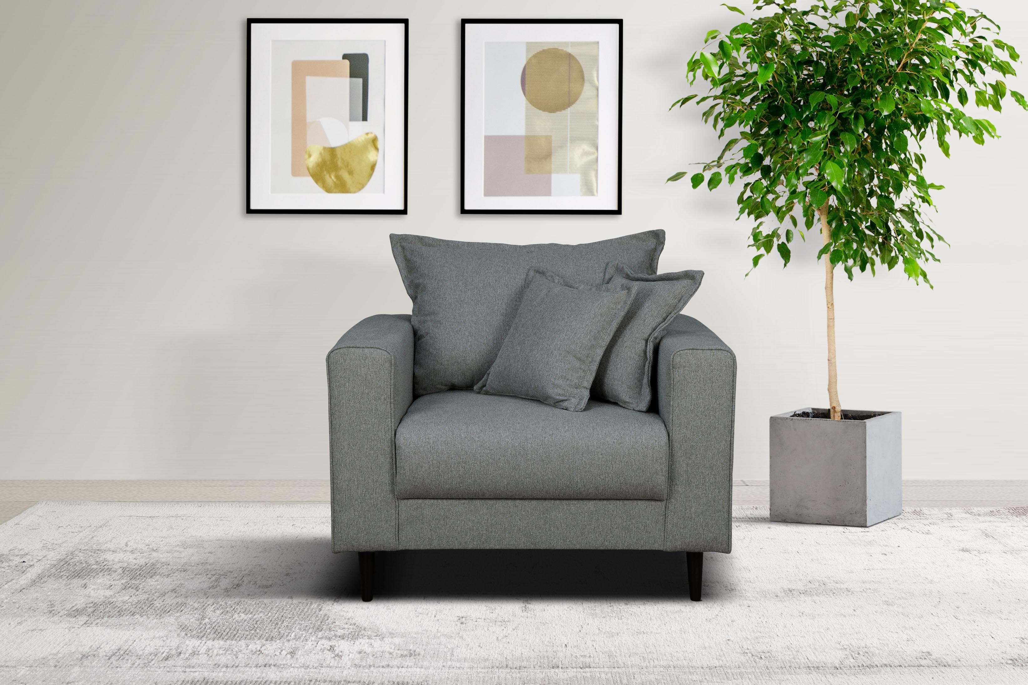 Gemütlicher Sessel mit Kederkissen und losem Rückenkissen